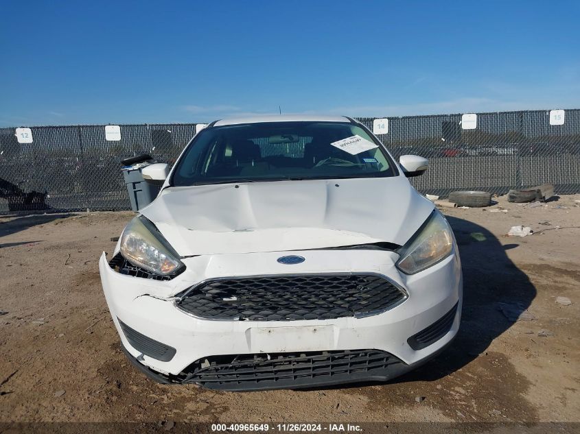 VIN 1FADP3K21HL216579 2017 FORD FOCUS no.12