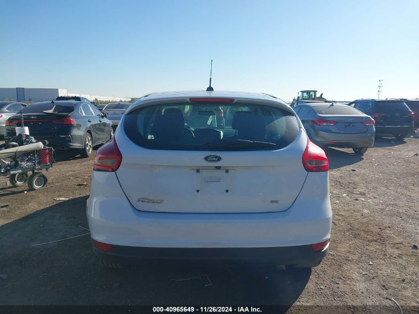 VIN 1FADP3K21HL216579 2017 FORD FOCUS no.16