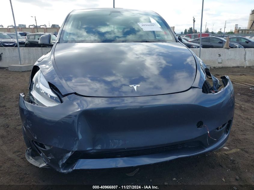 2023 Tesla Model Y Awd/Long Range Dual Motor All-Wheel Drive VIN: 7SAYGDEE2PA154019 Lot: 40966807