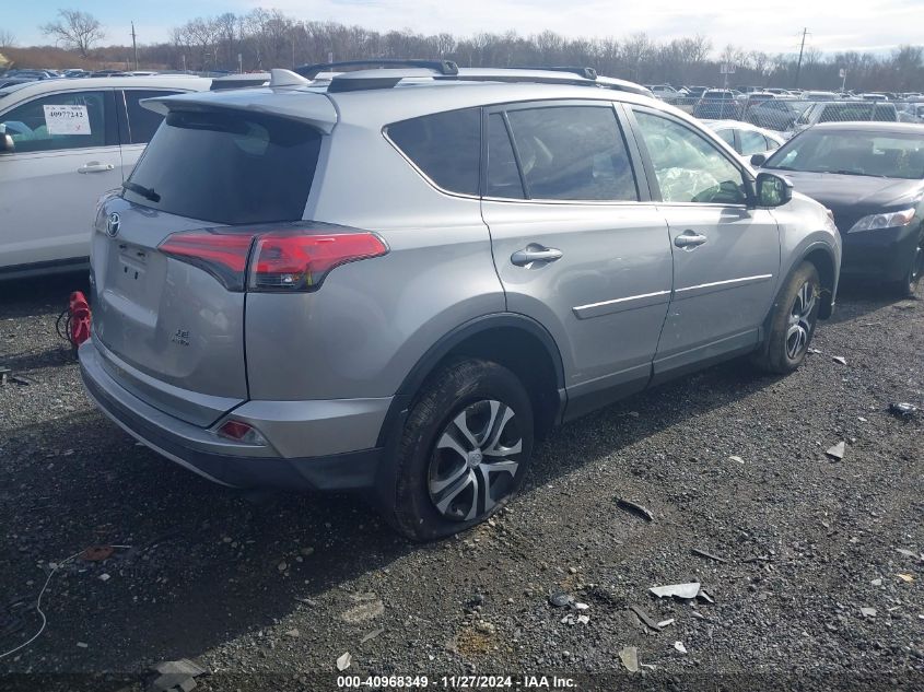 VIN JTMBFREV6JJ237006 2018 TOYOTA RAV4 no.4