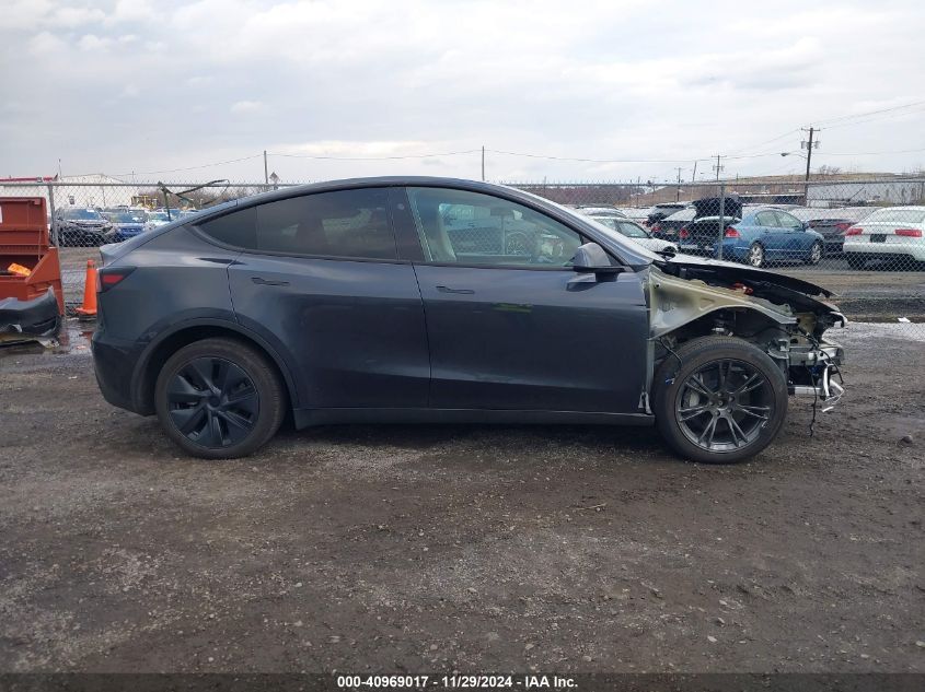 2024 Tesla Model Y Long Range Dual Motor All-Wheel Drive VIN: 7SAYGAEE0RF111500 Lot: 40969017