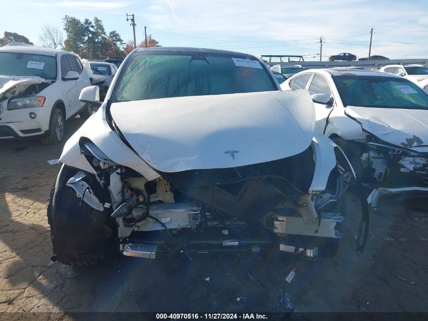 2023 Tesla Model Y Awd/Long Range Dual Motor All-Wheel Drive VIN: 7SAYGDEE3PA130666 Lot: 40970516