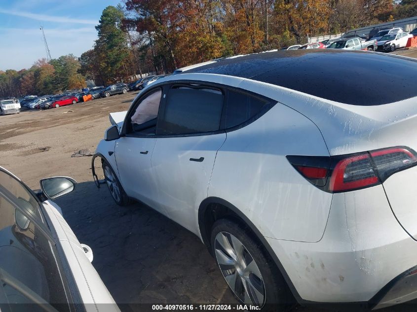 2023 Tesla Model Y Awd/Long Range Dual Motor All-Wheel Drive VIN: 7SAYGDEE3PA130666 Lot: 40970516