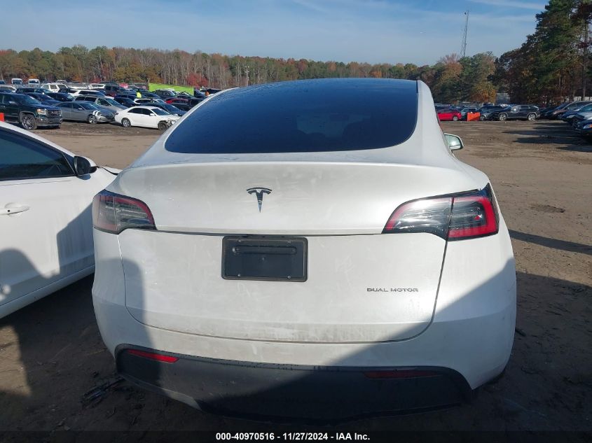 2023 Tesla Model Y Awd/Long Range Dual Motor All-Wheel Drive VIN: 7SAYGDEE3PA130666 Lot: 40970516