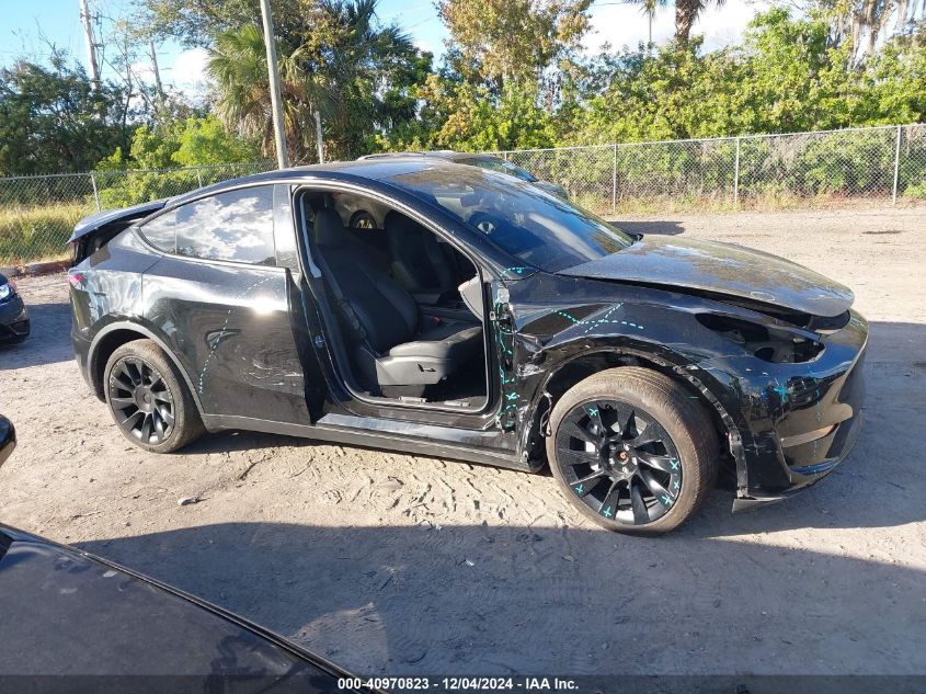 2023 Tesla Model Y Awd/Long Range Dual Motor All-Wheel Drive VIN: 7SAYGDEEXPA157184 Lot: 40970823