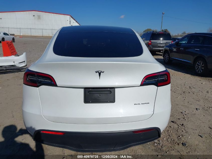 2023 Tesla Model Y Awd/Long Range Dual Motor All-Wheel Drive VIN: 7SAYGAEE1PF828338 Lot: 40978725