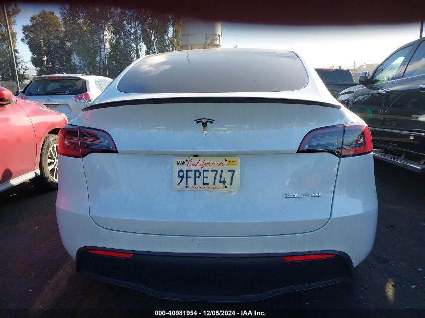 2023 Tesla Model Y VIN: 7SAYGDEF9PF710712 Lot: 40981954