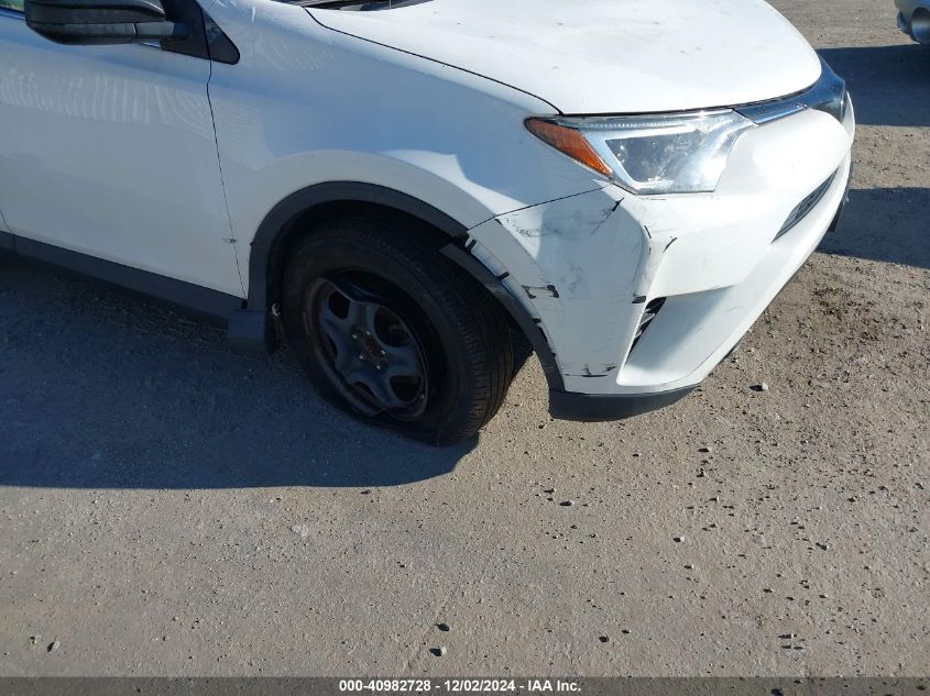 VIN JTMBFREV9JJ259615 2018 TOYOTA RAV4 no.18