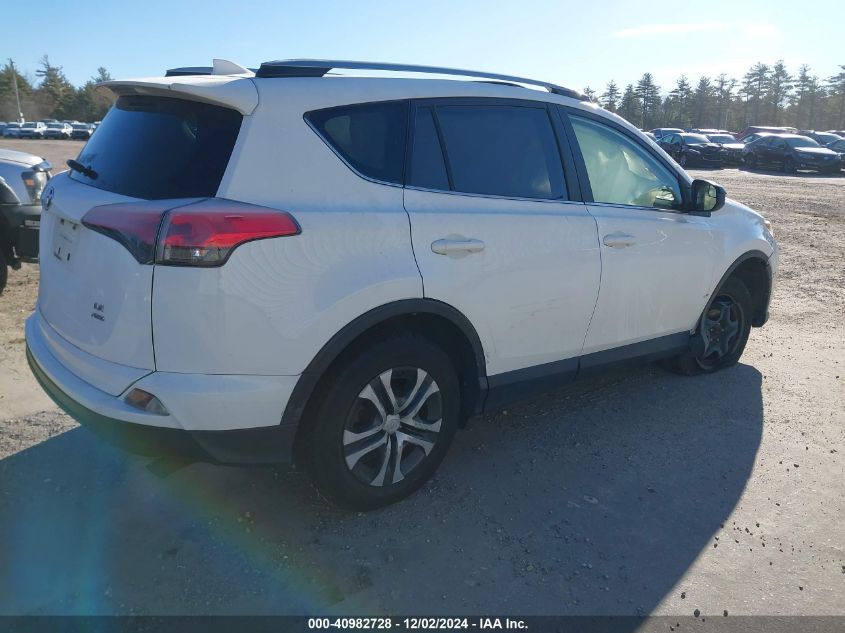 VIN JTMBFREV9JJ259615 2018 TOYOTA RAV4 no.4