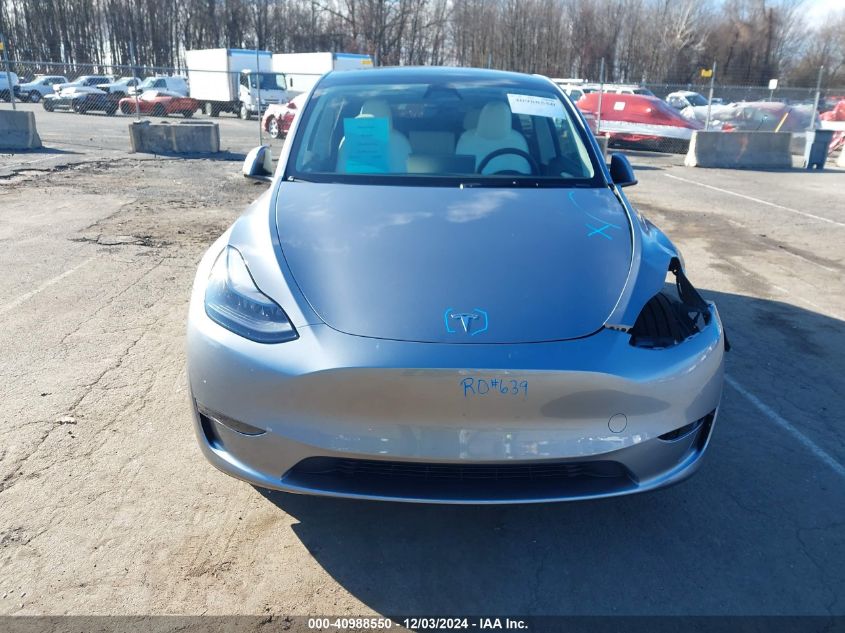 2024 Tesla Model Y Long Range Dual Motor All-Wheel Drive VIN: 7SAYGDEE1RA293948 Lot: 40988550