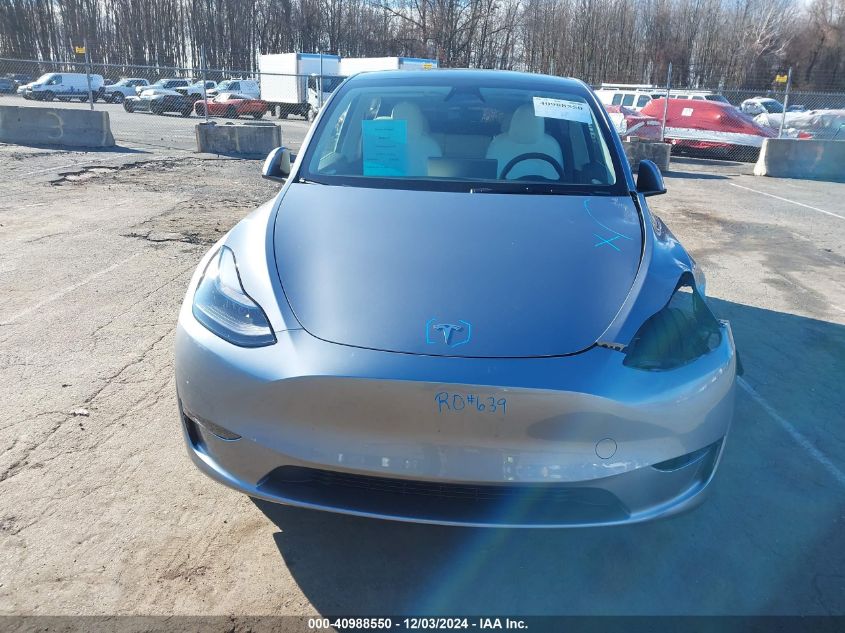 2024 Tesla Model Y Long Range Dual Motor All-Wheel Drive VIN: 7SAYGDEE1RA293948 Lot: 40988550