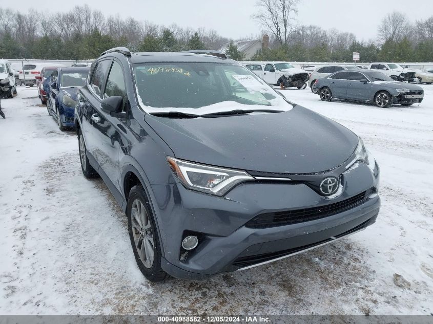 VIN JTMDFREV5JD251633 2018 Toyota RAV4, Limited no.1