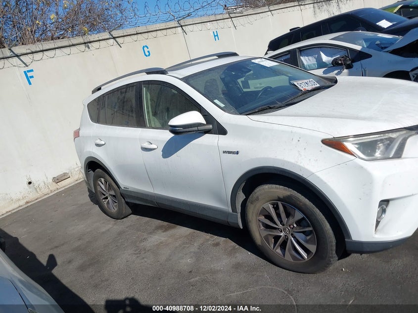 2018 TOYOTA RAV4 HYBRID XLE - JTMRJREV7JD203040