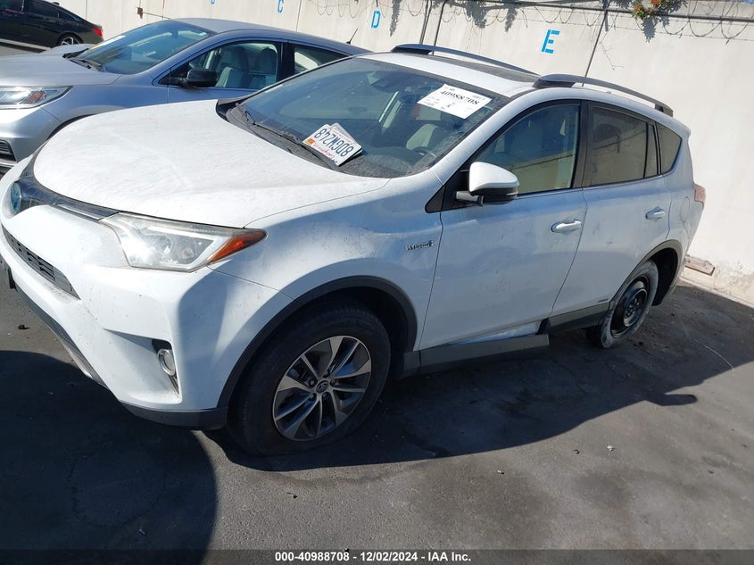 2018 TOYOTA RAV4 HYBRID XLE - JTMRJREV7JD203040
