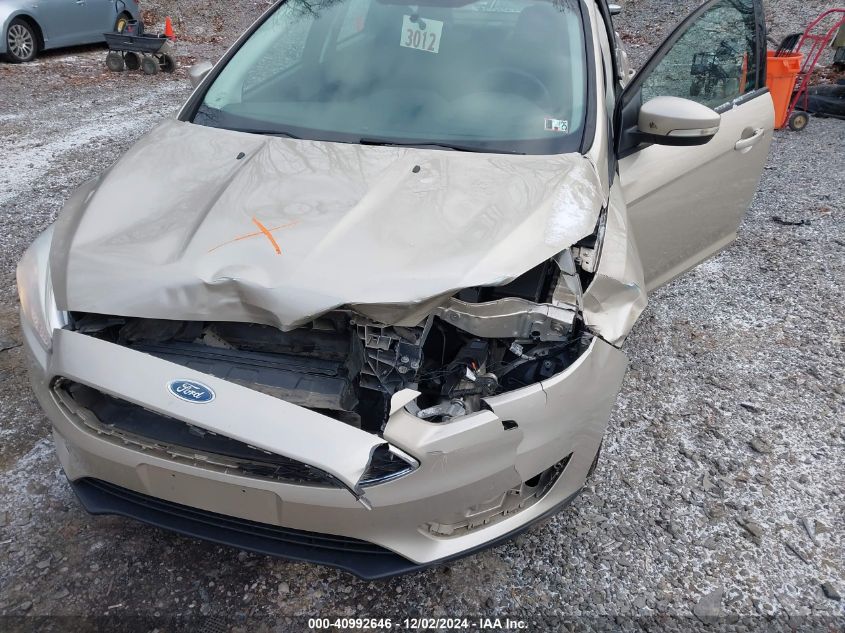 VIN 1FADP3F24HL320011 2017 Ford Focus, SE no.12