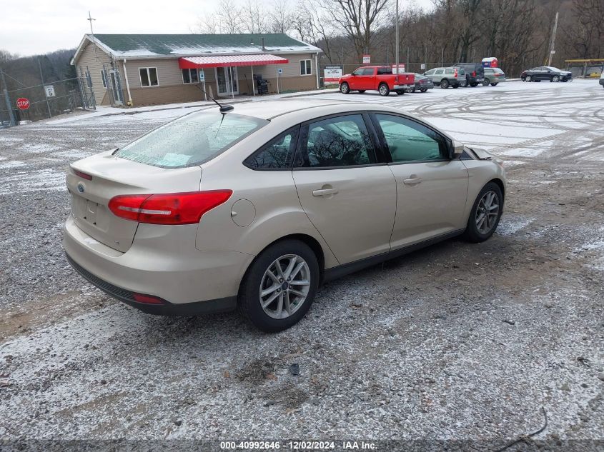 VIN 1FADP3F24HL320011 2017 Ford Focus, SE no.4