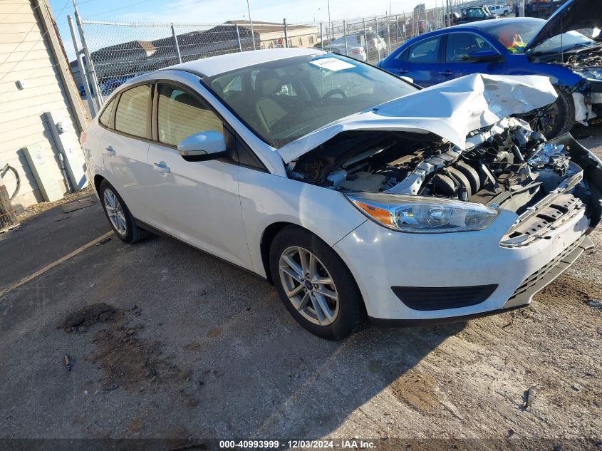 VIN 1FADP3F21HL296587 2017 Ford Focus, SE no.1