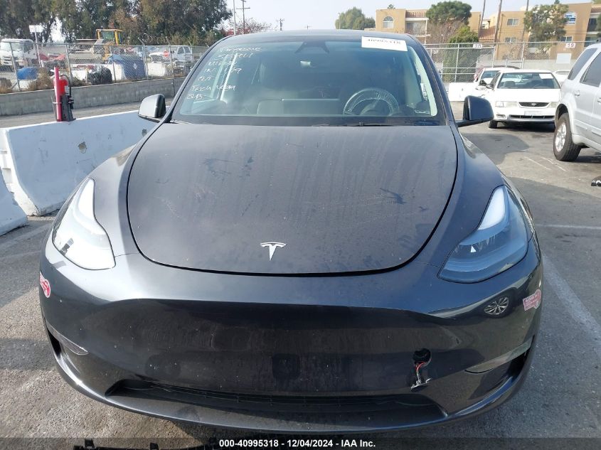 2024 Tesla Model Y Long Range Dual Motor All-Wheel Drive VIN: 7SAYGAEE4RF190394 Lot: 40995318