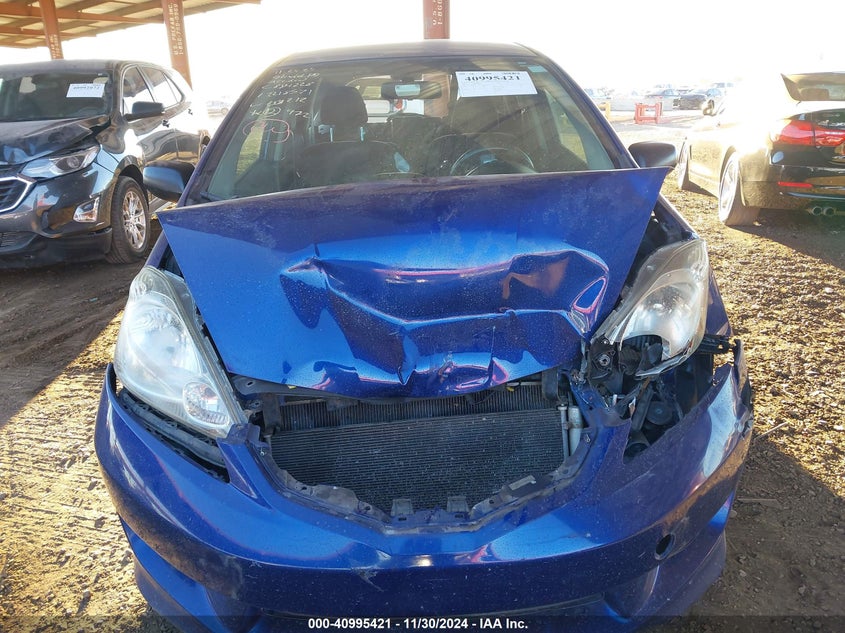 2009 HONDA FIT VIN: JHMGE886X9S008212