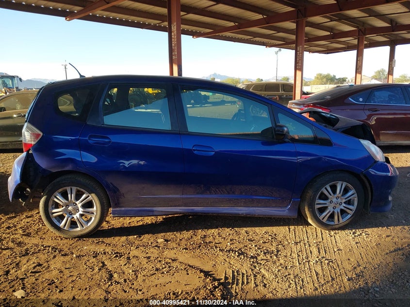 2009 HONDA FIT VIN: JHMGE886X9S008212