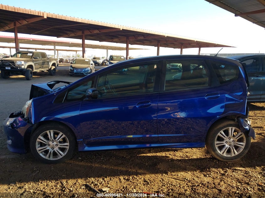 2009 HONDA FIT VIN: JHMGE886X9S008212