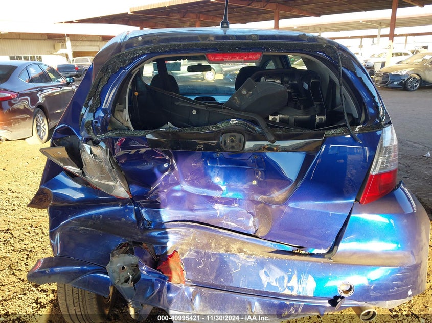 2009 HONDA FIT VIN: JHMGE886X9S008212