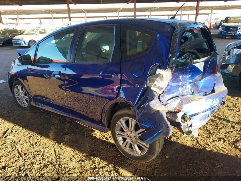 2009 HONDA FIT VIN: JHMGE886X9S008212