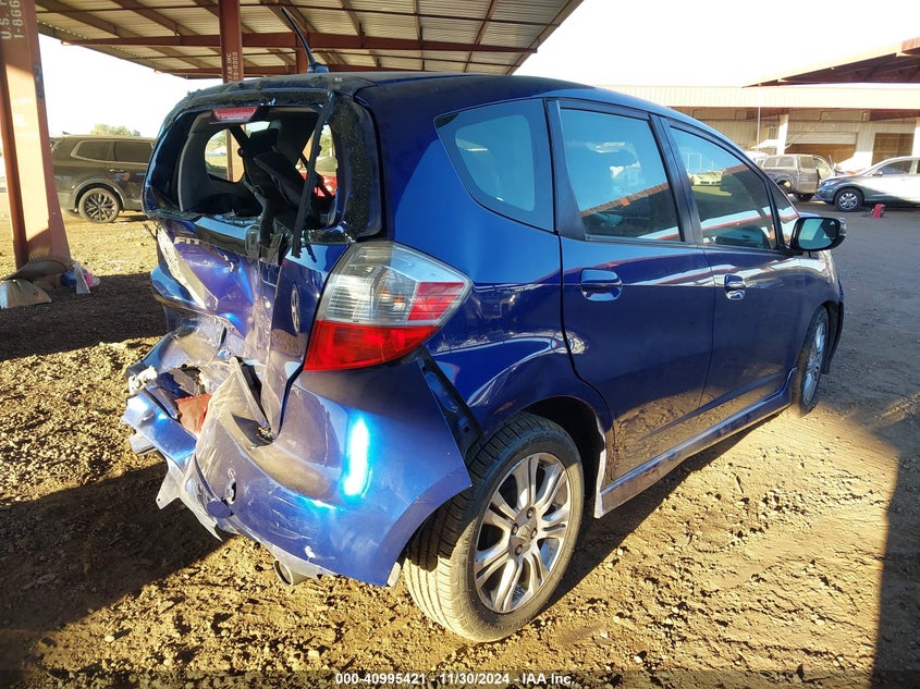 2009 HONDA FIT VIN: JHMGE886X9S008212
