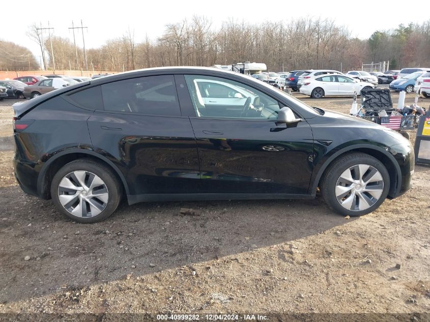 2023 Tesla Model Y Awd/Long Range Dual Motor All-Wheel Drive VIN: 7SAYGDEE8PA181550 Lot: 40999282