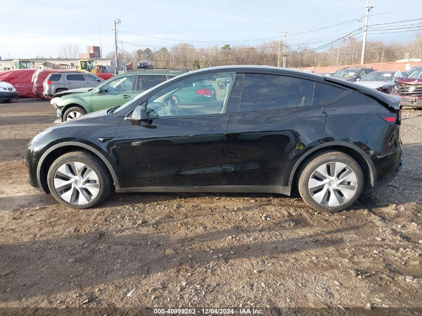 2023 Tesla Model Y Awd/Long Range Dual Motor All-Wheel Drive VIN: 7SAYGDEE8PA181550 Lot: 40999282