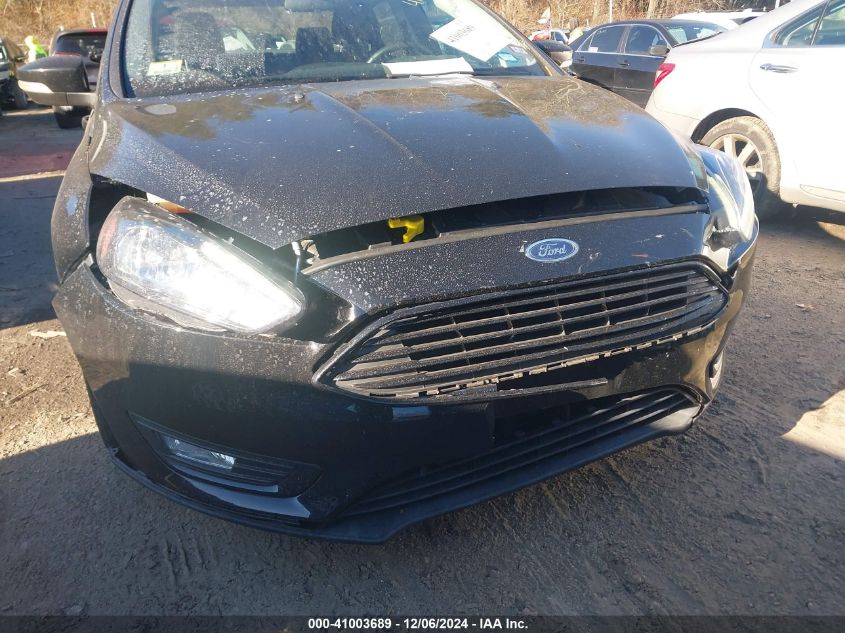 VIN 1FADP3FE9HL301318 2017 Ford Focus, SE no.6