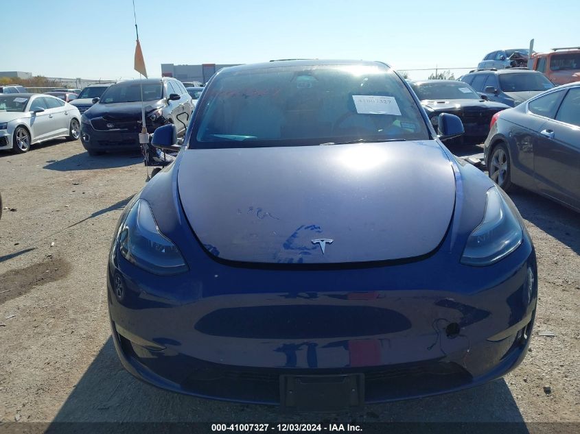 2023 Tesla Model Y Awd/Long Range Dual Motor All-Wheel Drive VIN: 7SAYGDEE1PF635916 Lot: 41007327