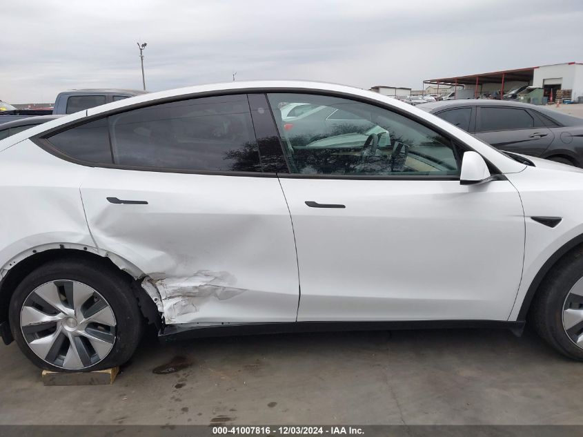 2023 Tesla Model Y Awd/Long Range Dual Motor All-Wheel Drive VIN: 7SAYGDEE2PA101238 Lot: 41007816