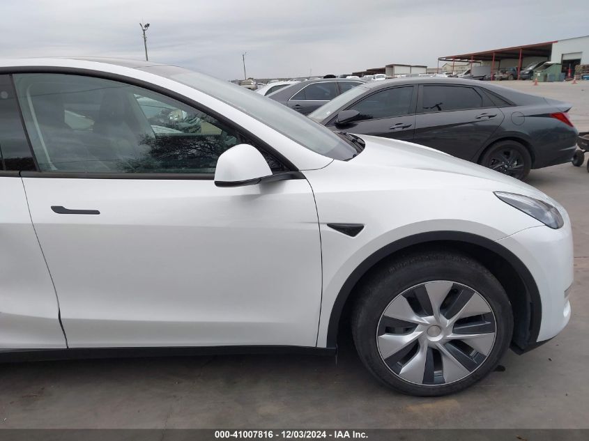 2023 Tesla Model Y Awd/Long Range Dual Motor All-Wheel Drive VIN: 7SAYGDEE2PA101238 Lot: 41007816