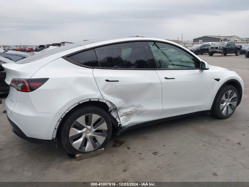 2023 Tesla Model Y Awd/Long Range Dual Motor All-Wheel Drive VIN: 7SAYGDEE2PA101238 Lot: 41007816