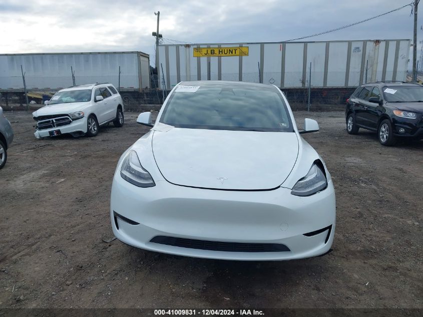 2023 Tesla Model Y Awd/Long Range Dual Motor All-Wheel Drive VIN: 7SAYGDEE5PA097475 Lot: 41009831