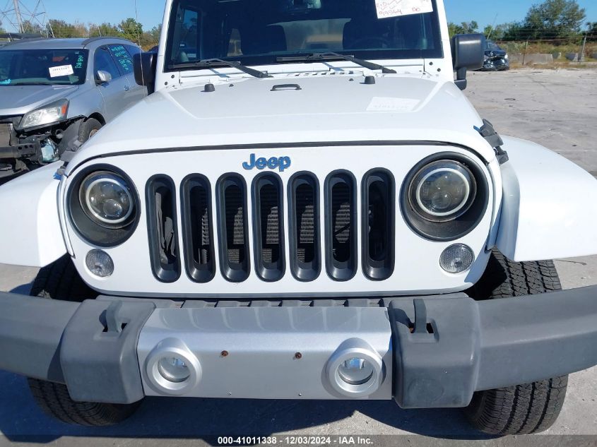 2014 Jeep Wrangler Unlimited Sahara VIN: 1C4BJWEG4EL213599 Lot: 41011338