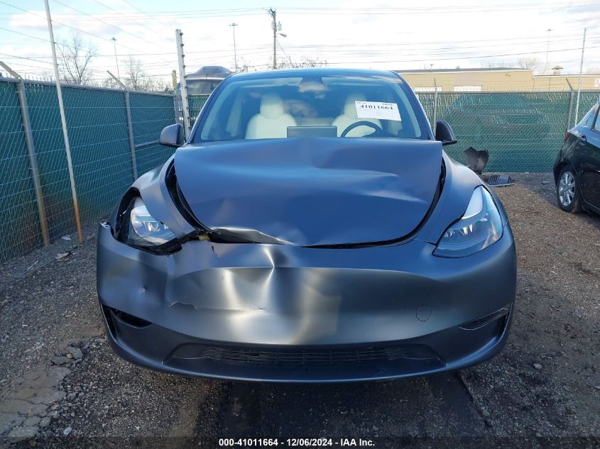 2023 Tesla Model Y Awd/Long Range Dual Motor All-Wheel Drive VIN: 7SAYGDEE4PF662883 Lot: 41011664