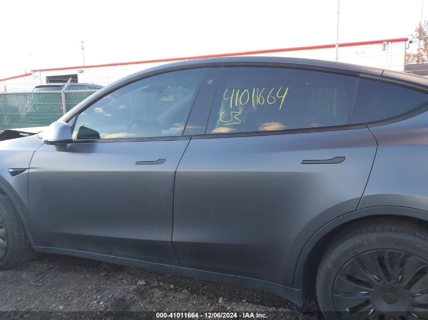 2023 Tesla Model Y Awd/Long Range Dual Motor All-Wheel Drive VIN: 7SAYGDEE4PF662883 Lot: 41011664