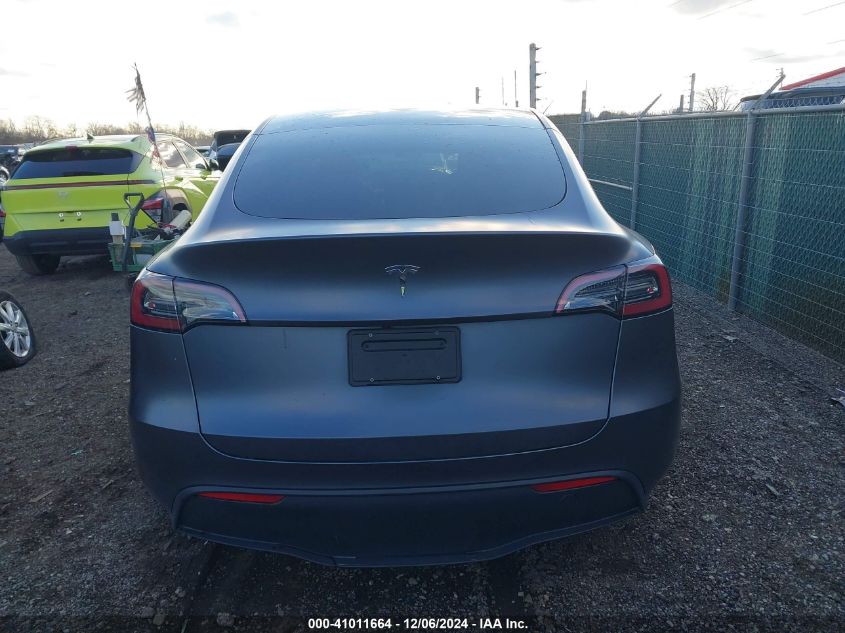 2023 Tesla Model Y Awd/Long Range Dual Motor All-Wheel Drive VIN: 7SAYGDEE4PF662883 Lot: 41011664