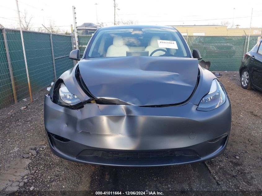 2023 Tesla Model Y Awd/Long Range Dual Motor All-Wheel Drive VIN: 7SAYGDEE4PF662883 Lot: 41011664