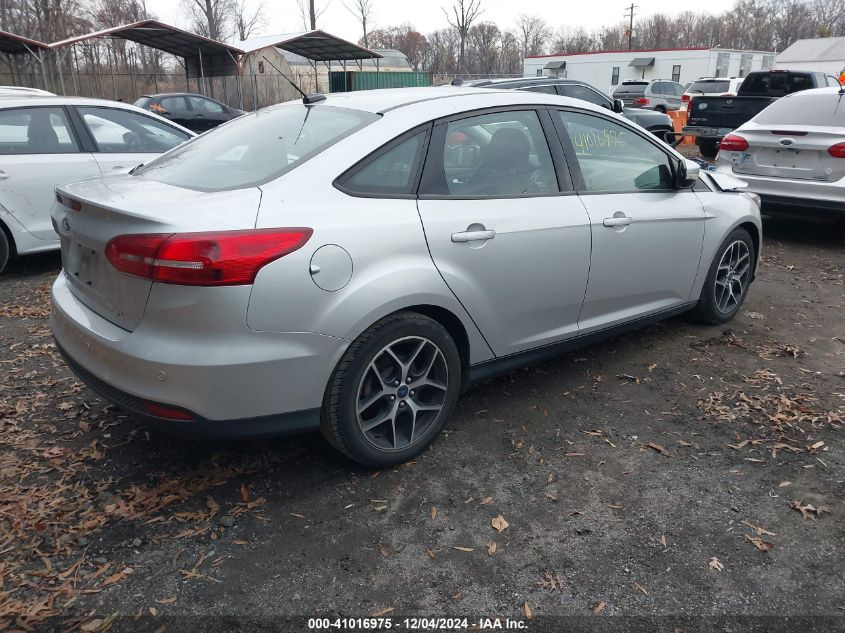 VIN 1FADP3H23HL269954 2017 FORD FOCUS no.4