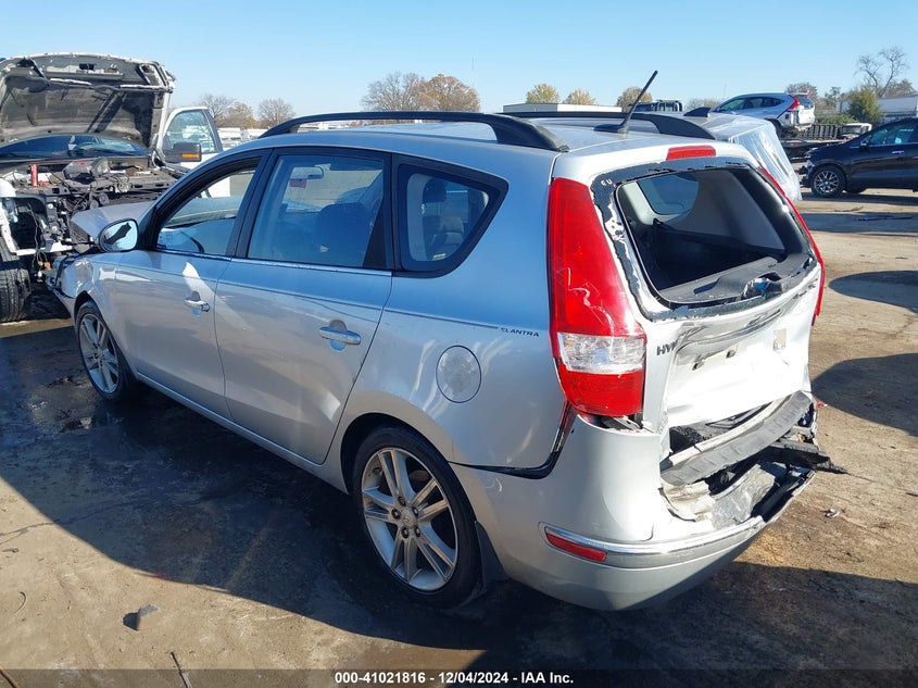 2010 HYUNDAI ELANTRA TOURING VIN: KMHDC8AE1AU068010