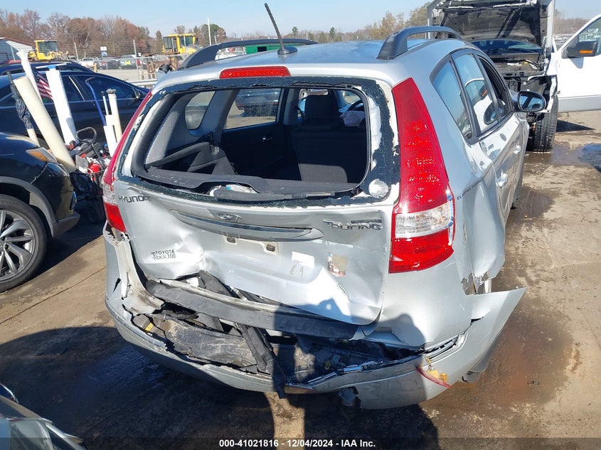 2010 HYUNDAI ELANTRA TOURING VIN: KMHDC8AE1AU068010