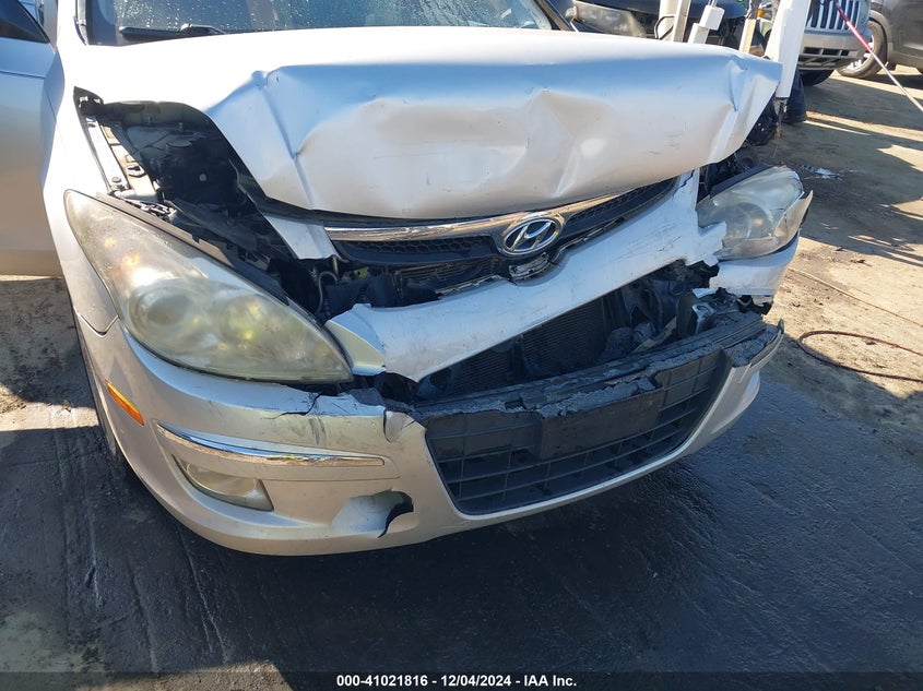 2010 HYUNDAI ELANTRA TOURING VIN: KMHDC8AE1AU068010