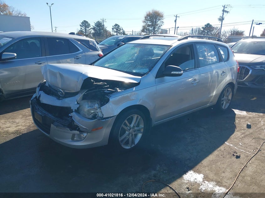 2010 HYUNDAI ELANTRA TOURING VIN: KMHDC8AE1AU068010