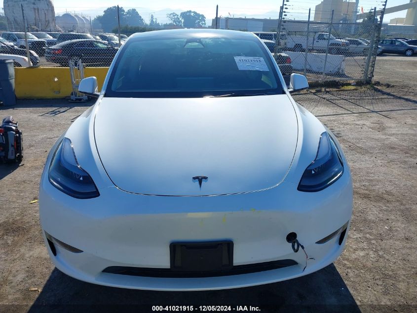 2023 Tesla Model Y Awd/Long Range Dual Motor All-Wheel Drive VIN: 7SAYGAEE0PF630933 Lot: 41021915