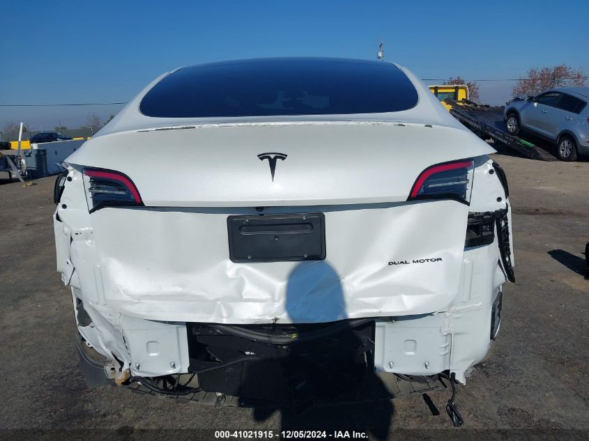 2023 Tesla Model Y Awd/Long Range Dual Motor All-Wheel Drive VIN: 7SAYGAEE0PF630933 Lot: 41021915