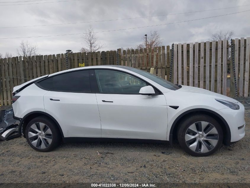 2023 Tesla Model Y Awd/Long Range Dual Motor All-Wheel Drive VIN: 7SAYGDEE7PA121615 Lot: 41022338