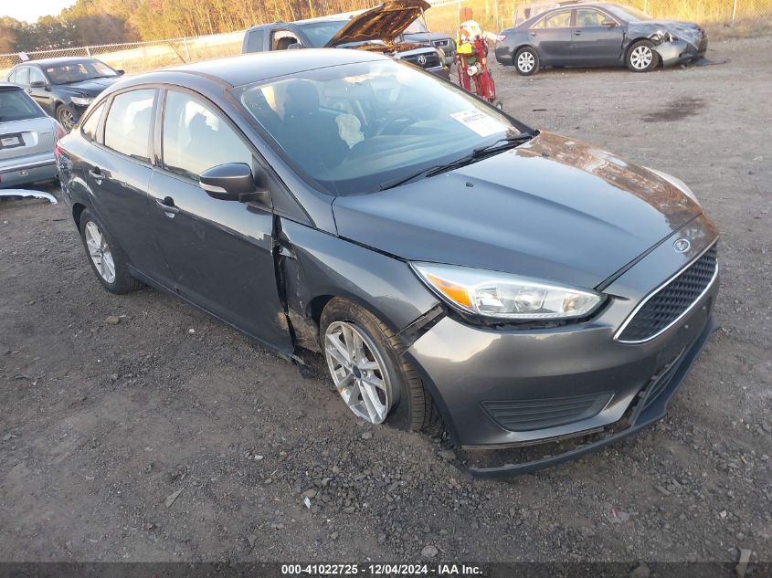 VIN 1FADP3F24HL233077 2017 FORD FOCUS no.1